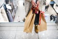 Senior woman with bags doing Christmas shopping. Royalty Free Stock Photo