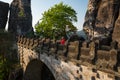 Senior woman on Bastei bridge in Saxon Switzerland, Germany Royalty Free Stock Photo