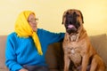 Senior woman with big dog