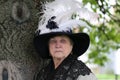 Old woman hat feather Royalty Free Stock Photo