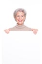 Senior woman with blank sign Royalty Free Stock Photo