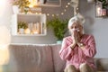 Senior woman blowing her nose Royalty Free Stock Photo