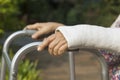 Senior woman broken wrist using walker Royalty Free Stock Photo