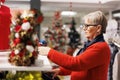 Senior woman browsing for accessories Royalty Free Stock Photo