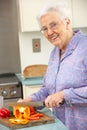 Senior woman chopping vegetables Royalty Free Stock Photo