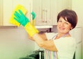 Senior woman cleaning