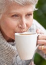 Senior woman, coffee and face with retirement for old age, and relaxation. Elderly person, grandma and closeup with Royalty Free Stock Photo