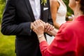 Senior woman congratulates to groom marriage