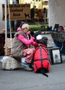 Senior Woman with Coonhound at Adoption Event