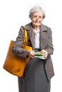 Senior woman counting money over white Royalty Free Stock Photo