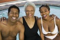 Senior woman and couple at swimming pool portrait.