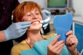 Senior woman in the dental office. Royalty Free Stock Photo