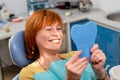 Senior woman in the dental office.