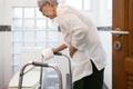 Senior woman with diarrhea holding tissue roll near a toilet bowl,elderly have abdominal pain,stomach ache,constipation in Royalty Free Stock Photo