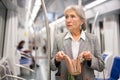 Senior woman discovered theft in subway train Royalty Free Stock Photo