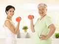 Senior woman doing dumbbell exercise Royalty Free Stock Photo