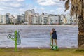 Senior Woman Doing Exercise at Waterfront Park, Montevideo, Uruguay