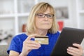 Senior woman doing online shopping Royalty Free Stock Photo