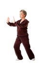 Senior woman doing Tai Chi Yoga exercise Royalty Free Stock Photo