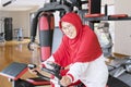 Senior woman doing workout on exercise bike Royalty Free Stock Photo