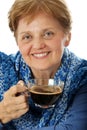 A senior woman drinking a cup of coffee Royalty Free Stock Photo