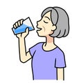 A senior woman drinking water