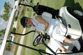 Senior woman driving golf cart