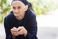 Senior woman eating cherry Royalty Free Stock Photo