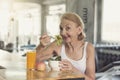Senior woman eating healthy salad and orange juice. elderly health lifestyle nutrition concept Royalty Free Stock Photo