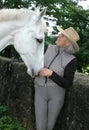 Senior woman equestrian with horse Royalty Free Stock Photo