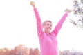 Senior woman exercising with dumbbells in park Royalty Free Stock Photo