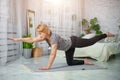 Senior woman exercising home, the concept of a healthy lifestyle, fitness and yoga Royalty Free Stock Photo