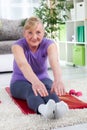 Senior woman exercising at home Royalty Free Stock Photo