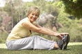 Senior Woman Exercising In Park Royalty Free Stock Photo