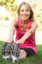 Senior Woman Exercising In Park Royalty Free Stock Photo