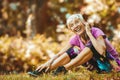 Senior active woman exercising in park while listening to music Royalty Free Stock Photo