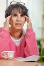 Senior woman with eyes ache Royalty Free Stock Photo