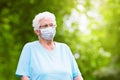 Senior woman in face mask. Virus outbreak