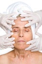 Senior woman face in rubber gloves hands Royalty Free Stock Photo