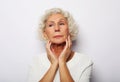 Senior woman feeling blue worried about problems, pensive upset sad middle aged grey haired lady Royalty Free Stock Photo