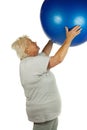 Senior woman with a fit ball Royalty Free Stock Photo