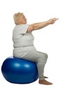 Senior woman with a fit ball Royalty Free Stock Photo