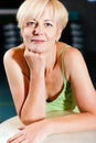 Senior Woman with fitness ball in gym Royalty Free Stock Photo
