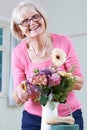 Senior Woman In Flower Arranging Class Royalty Free Stock Photo