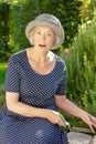 Senior woman garden mock surprise Royalty Free Stock Photo