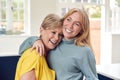 Senior Woman Greeting And Hugging Grown Up Adult Daughter At Home Royalty Free Stock Photo