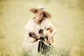 Senior woman with guitar outdoors