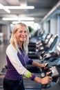 A senior woman in gym doing cardio work out exercise. Royalty Free Stock Photo