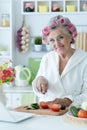 Portrait of senior woman in hair rollers Royalty Free Stock Photo