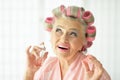 Senior woman in hair rollers Royalty Free Stock Photo